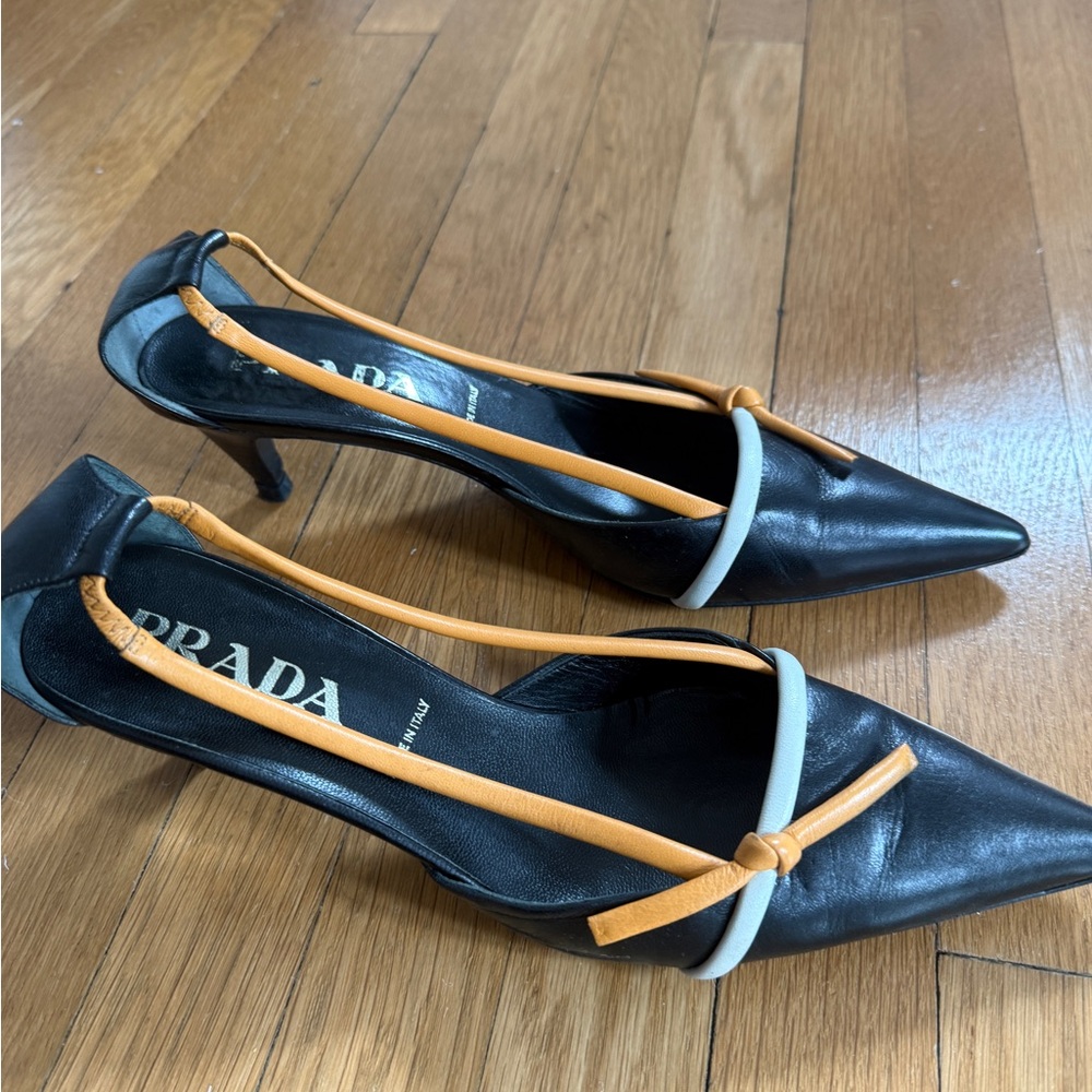 Prada Women's Black Leather Heels with Orange Accents